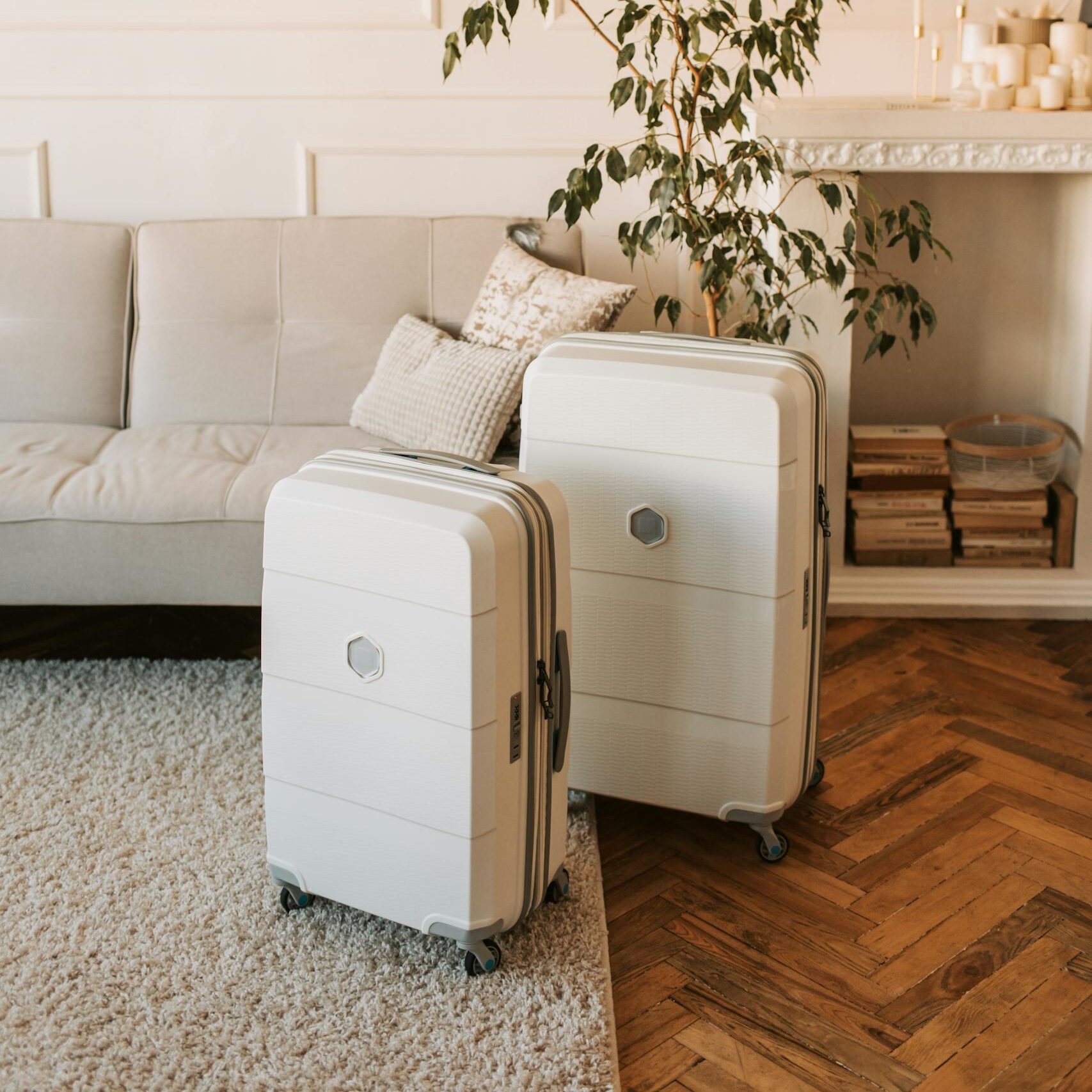 A stylish living room with packed luggage, ready for a travel adventure.