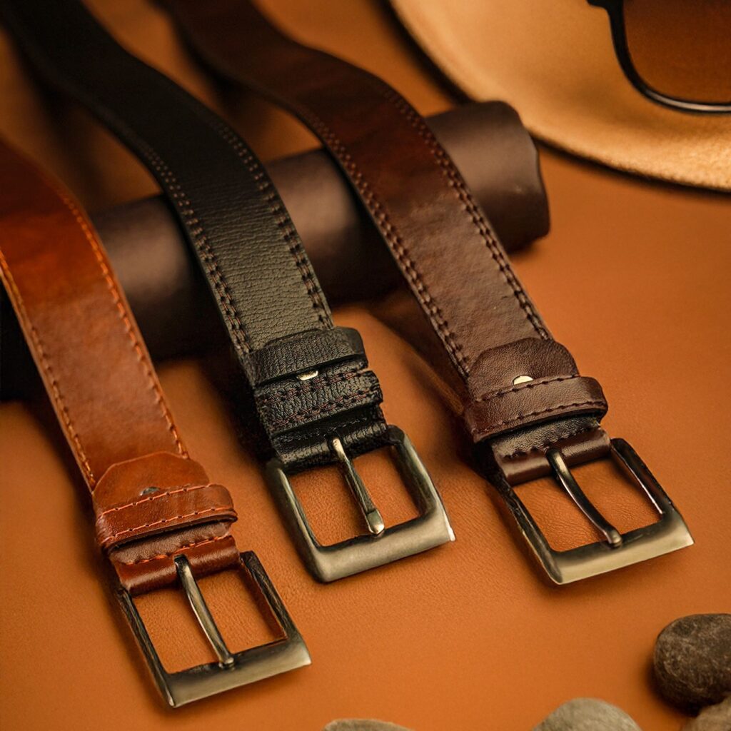 Discover premium men's leather belts in a stylish setting, perfect for luxury fashion shoots.